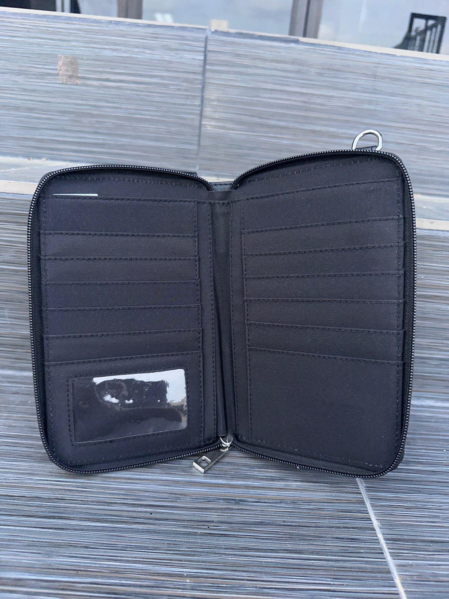 Mini crossbody bag with skull hardware, frills, and front phone pocket