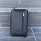 Mini crossbody bag with skull hardware, frills, and front phone pocket