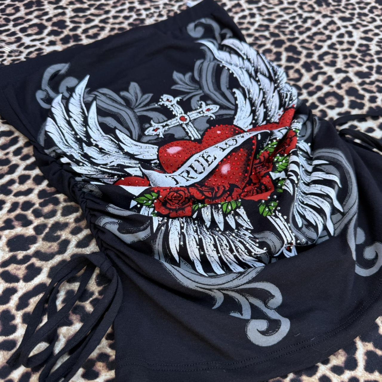 True love tube top Y2K style on cheetah backdrop