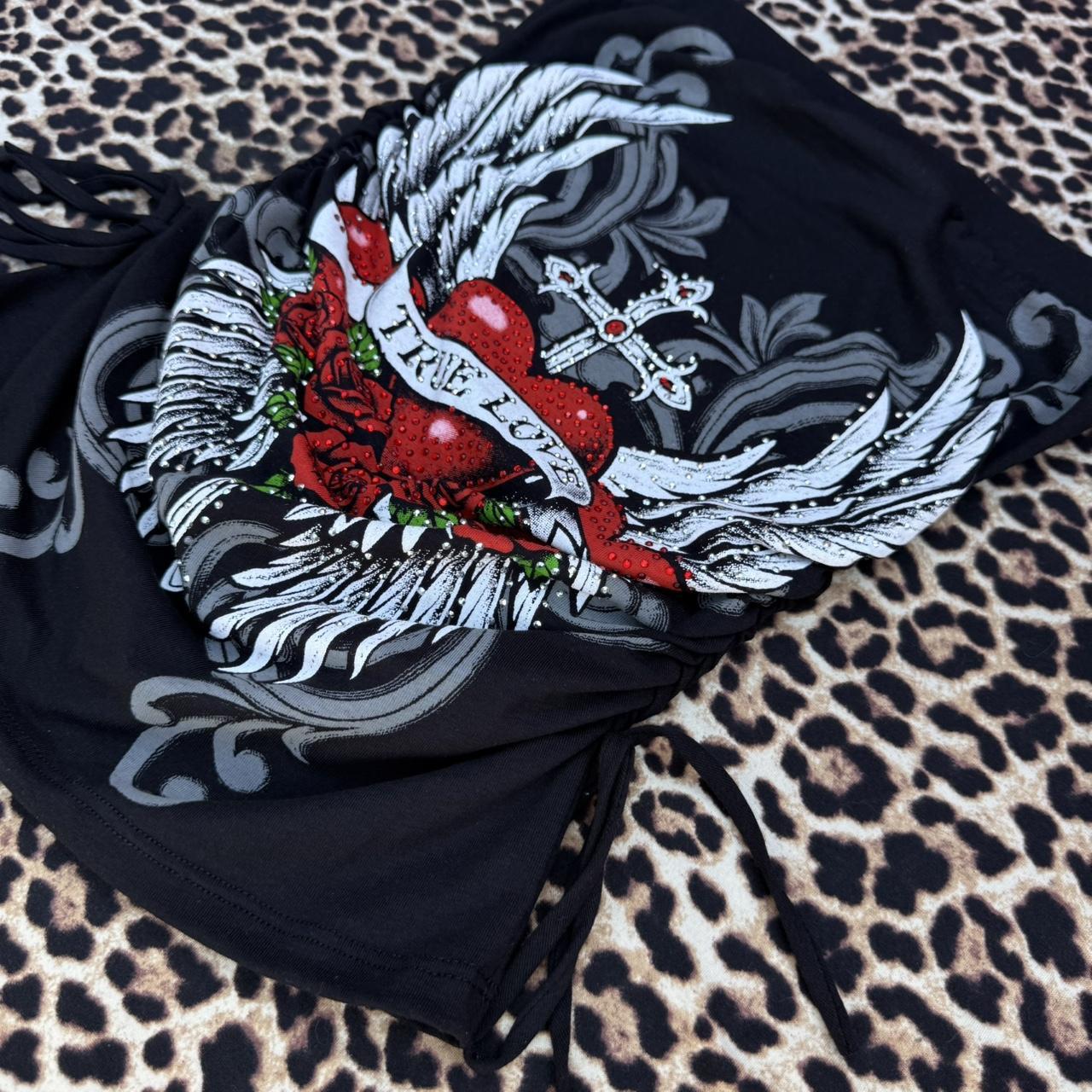 true love tube top from an angle on cheetah background