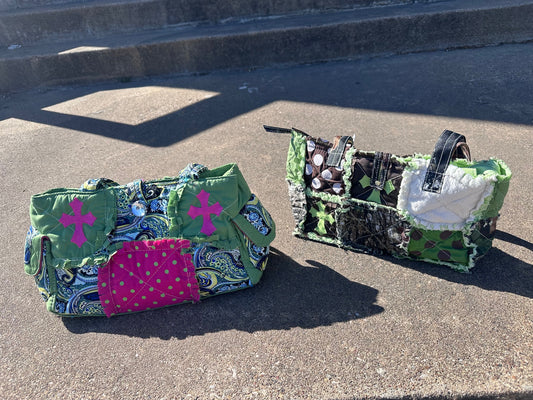 Two colorful bags on a concrete surface with steps in the background