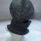 Gray knitted hat and scarf set back 