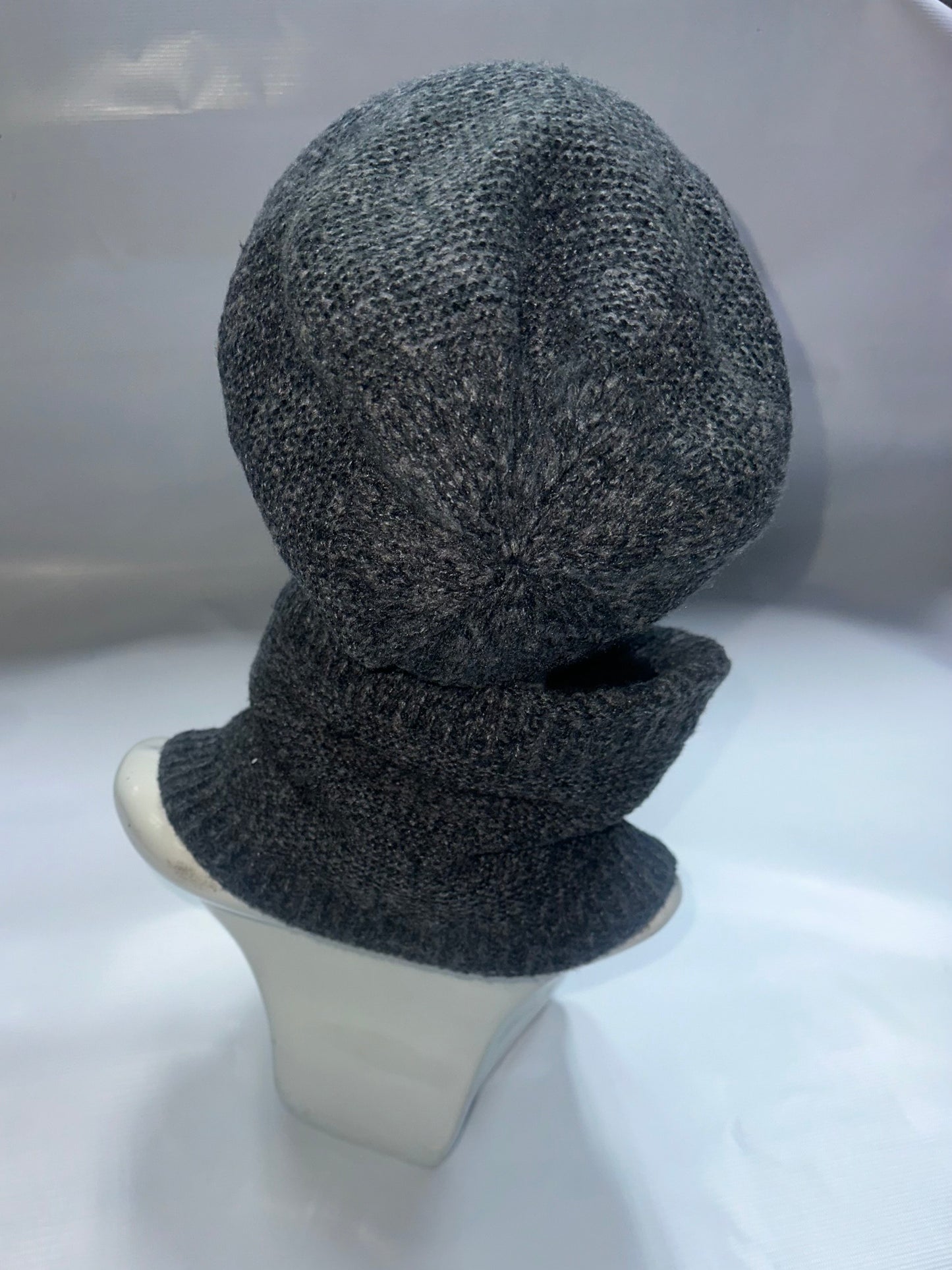 Gray knitted hat and scarf set back 