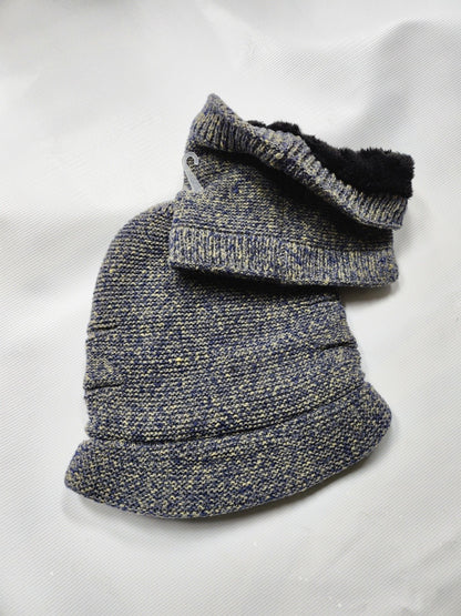 Gray knitted beanie hat and scarf set with a fur lined collar on a white background